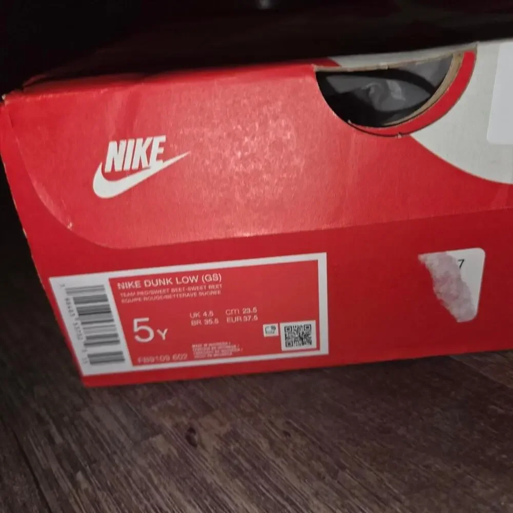 Nike pink low top trainers